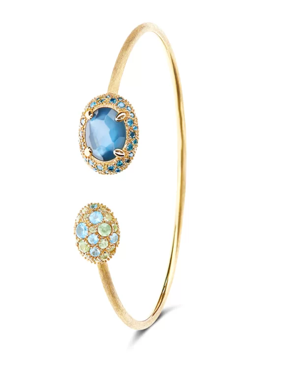 BRACCIALE A SCHIAVA "DANCING REVERSE" IN ORO, DIAMANTI BLU, TOPAZIO AZZURRO SWISS, ZAFFIRI VERDI E TOPAZIO LONDON BLU