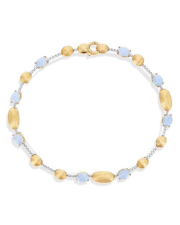 BRACCIALE TENNIS "DANCING AZURE" IN ORO, DIAMANTI E ACQUAMARINA